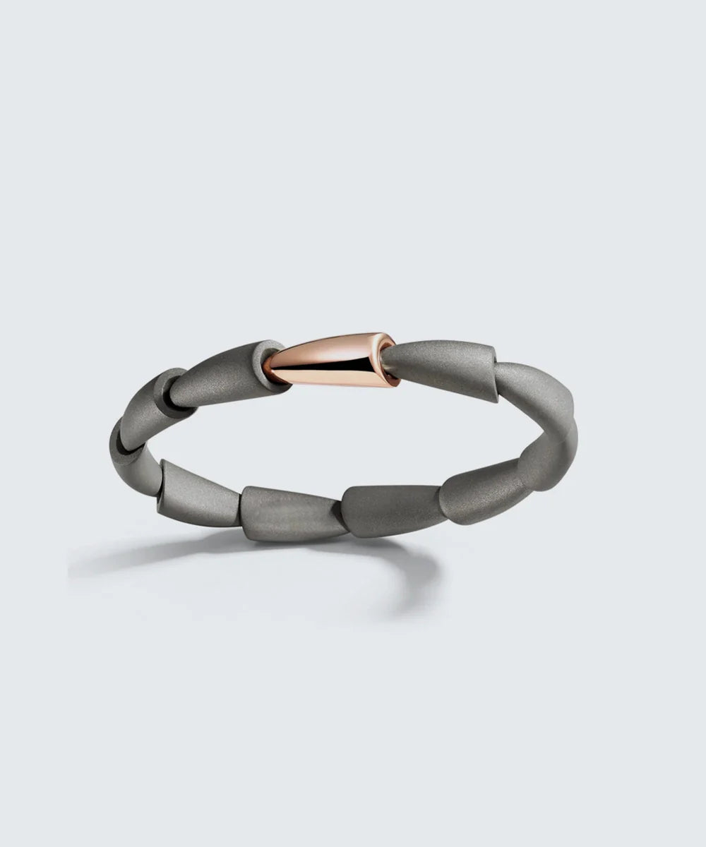 Black Stone Bracelet With Gold Accents in a sleek high-contrast midnight luxury editorial style